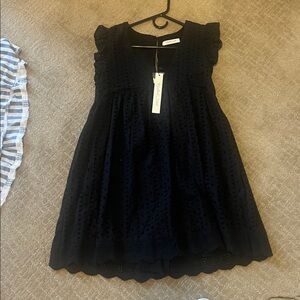 Mustard Seed Classic Black Apparel.  Eyelet romper, fully lined with shorts